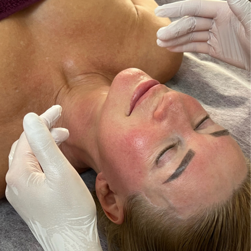 Facial massage treatment with a calm studio atmosphere