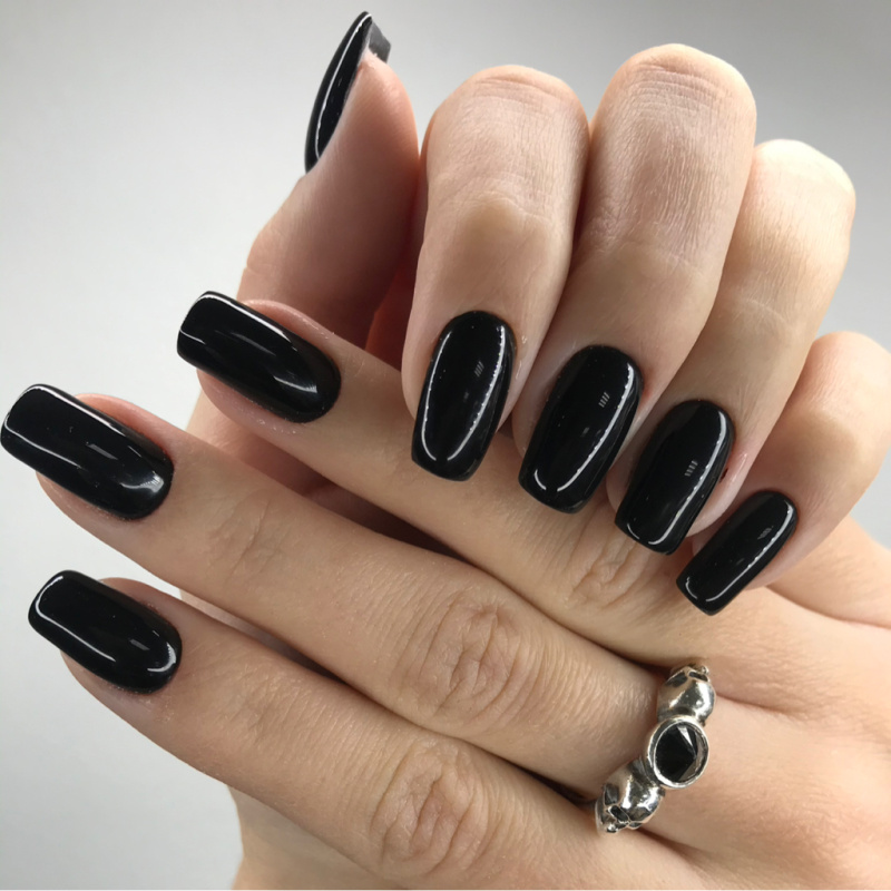 Classic black manicure with a polished finish